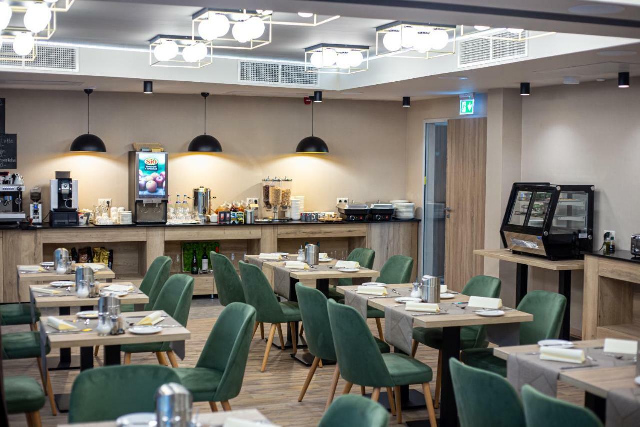 Lignum Hotel Miskolc Bagian luar foto