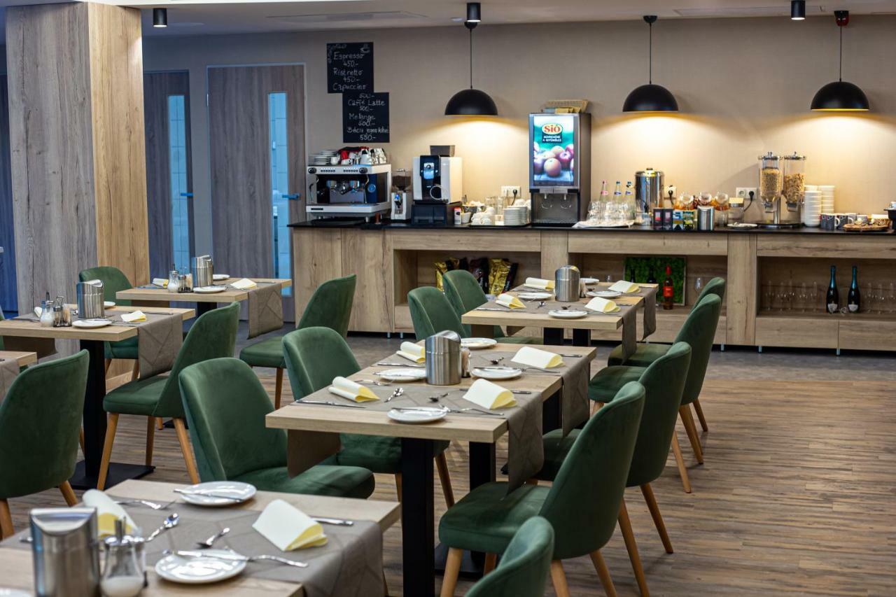 Lignum Hotel Miskolc Bagian luar foto